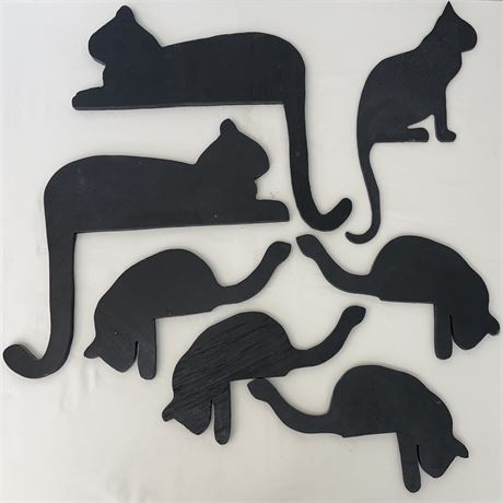 Grouping of Black Silhouette Sitting Cats