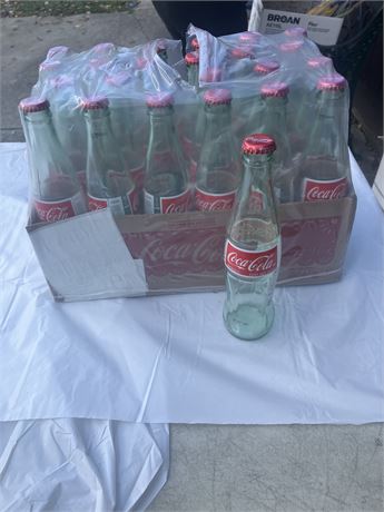 Case of glass Coca-Cola bottles,