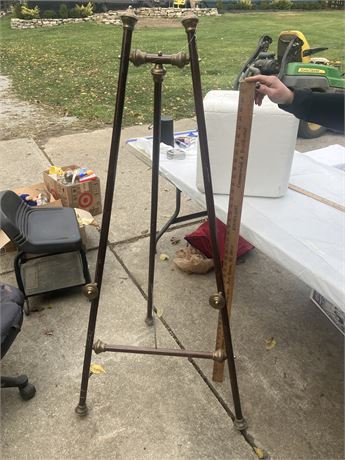 Vintage tripod, possibly a surveyor's tripod