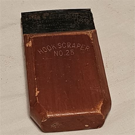 Vintage "Hook Scraper No. 25" paint scraper manufactured by the Hook Scraper Co.