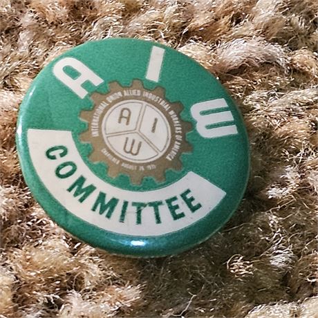 Pinback button from the Allied Industrial Workers (AIW) union, "Check-Off 1969"