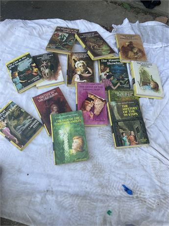 Vintage Nancy Drew mystery novels, written under the pseudonym Carolyn Keene