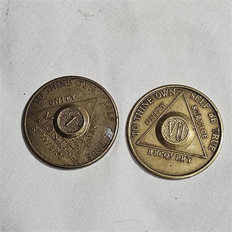 Two sobriety coins
