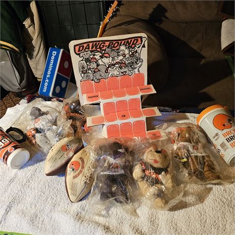 Collection of Cleveland Browns memorabilia, prominently featuring a "Dawg Pound"