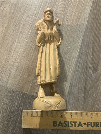 Hand-carved statue of The Good Shepherd.