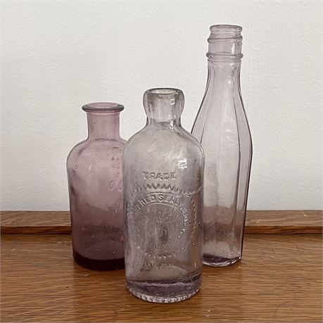 Early Amethyst Glass Bottles