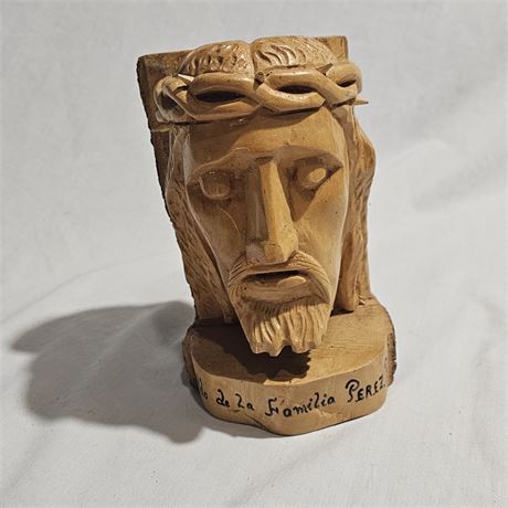 Hand-carved wooden bust of Jesus Christ.