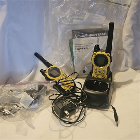 Cobra MicroTalk FRS 110-2 two-way radio set, including the operating instructio