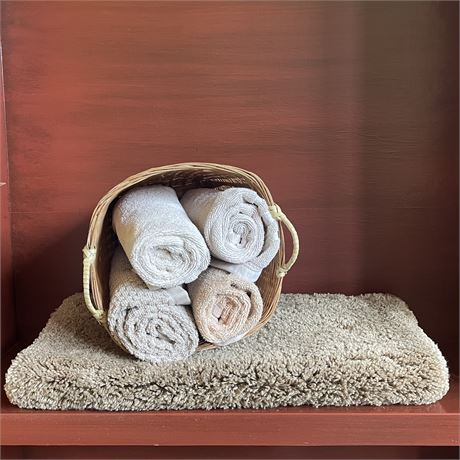 Bathroom Lot with Rug, Hand Towels, and a Decorative Basket