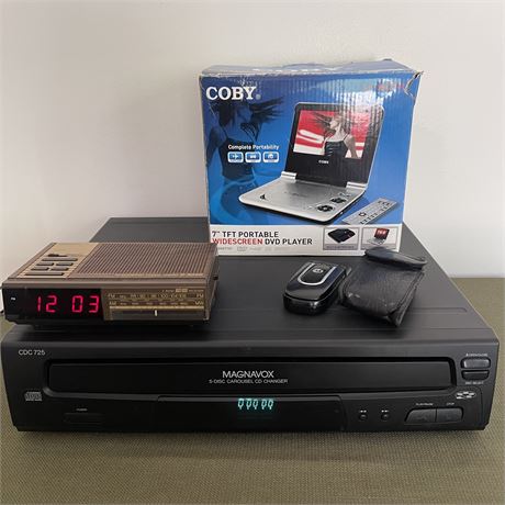 Magnavox CD Carousel & Clock Radio, Coby DVD Player & Motorola Flip Phone
