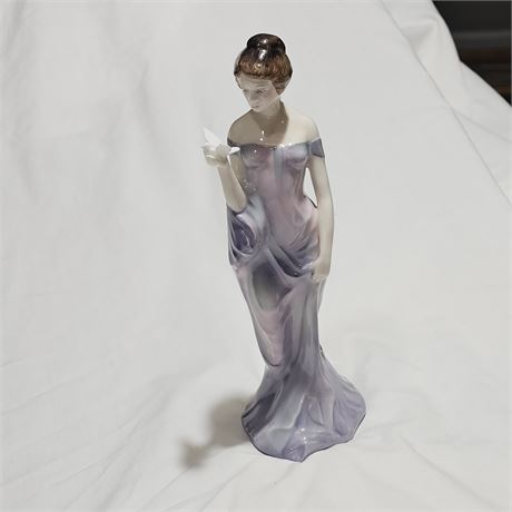 Harmony" (HN2824) from Royal Doulton's "Pretty Ladies" series.