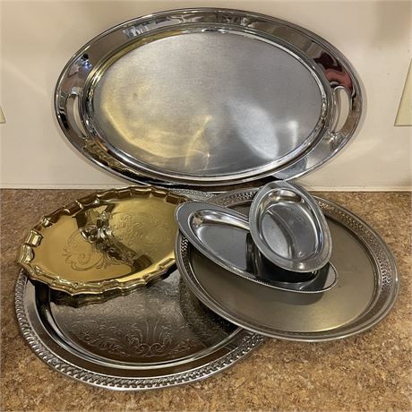 Array of Serving Trays and Platters in Silver and Gold Tones