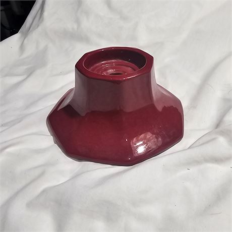 Burgundy-colored, hexagonal base