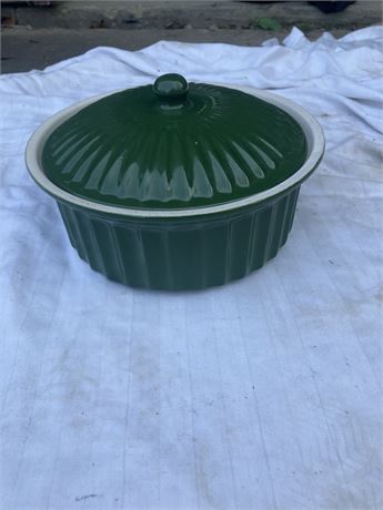 Ribbed ceramic casserole dish with a lid.