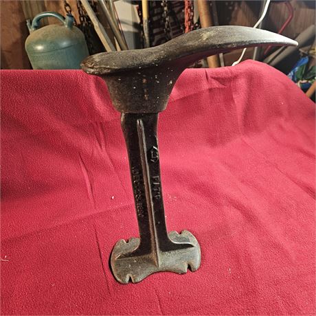antique cast iron cobbler's anvil with a shoe form