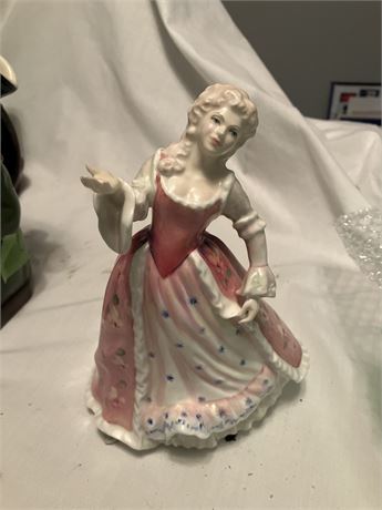 Royal Doulton figurine named "Caroline" with the model number HN 3694.