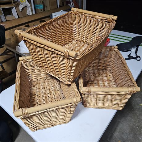 Set of three rustic wicker storage baskets