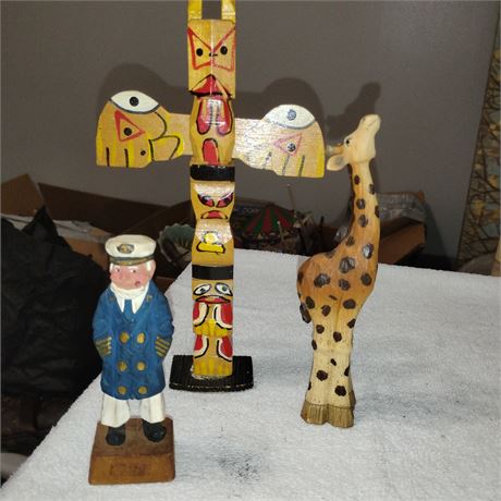 Vintage, hand-carved, and hand-painted wooden figurines,