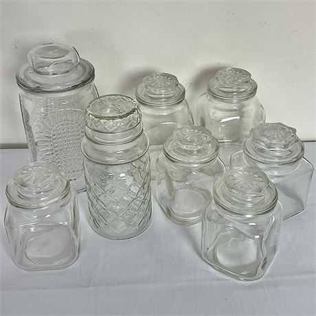 Collection of Clear Glass Lidded Canisters Including Mr. Peanuts Jar