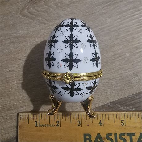 Egg-shaped trinket box, often referred to as a Fabergé-style egg.