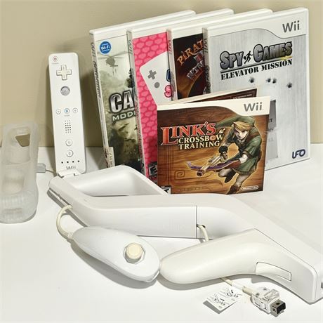 Wii Zapper, Controller, Nunchuck and Games w/ Call of Duty, Dodgeball and More