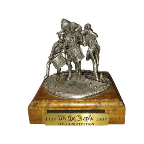 Pewter figurine titled "Call to Freedom" by artist Philip Kraczkowski.