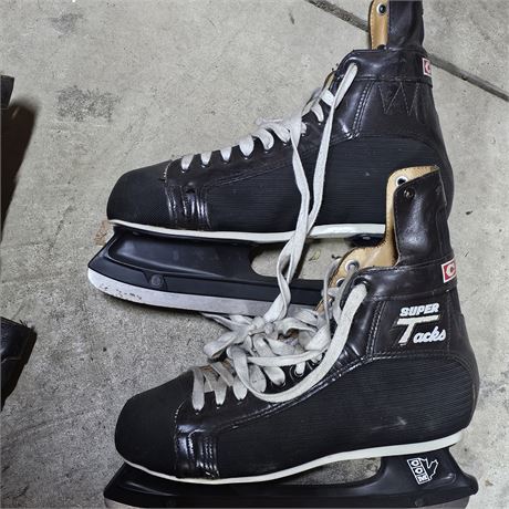 CCM Tacks ice hockey skates. Gloves and hockey sticks