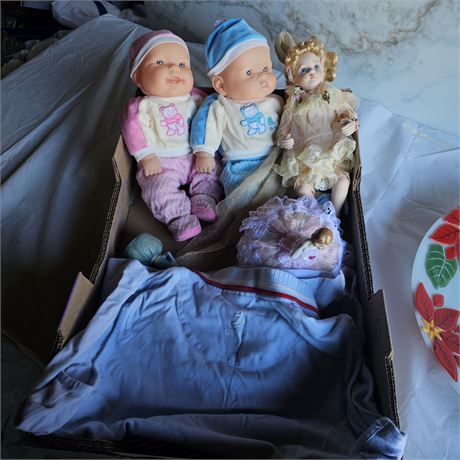 Collection of vintage or antique baby dolls.