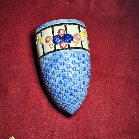 vintage pottery wall pocket.  blue woven or basket-weave pattern