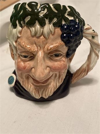 Bacchus ceramic mug by Royal Doulton,