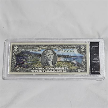 Colorized $2 bill featuring Hawaii Volcanoes National Park.