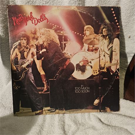 Album cover for "Too Much Too Soon" by the New York Dolls, which is a vinyl LP.