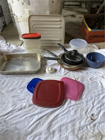 lot of miscellaneous kitchenware and food storage containers