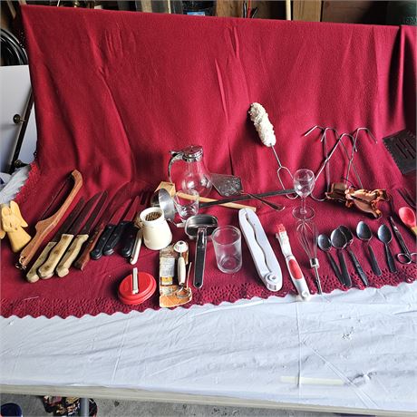 collection of vintage kitchen utensils and gadgets.
