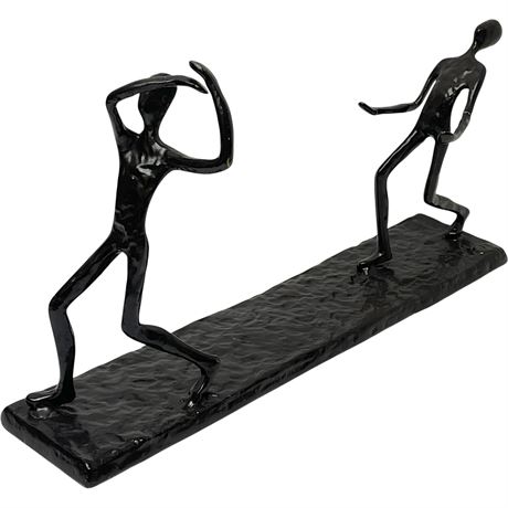 Metal Figural Wine Bottle Holding Sculpture