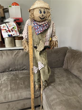 Primitive-style scarecrow doll.