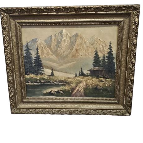 Framed oil painting depicting an alpine landscape with a small cabin, evergreen