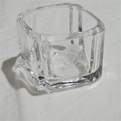 Clear glass votive or tealight candle holder,