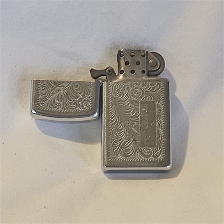 Zippo Slim Venetian lighter.