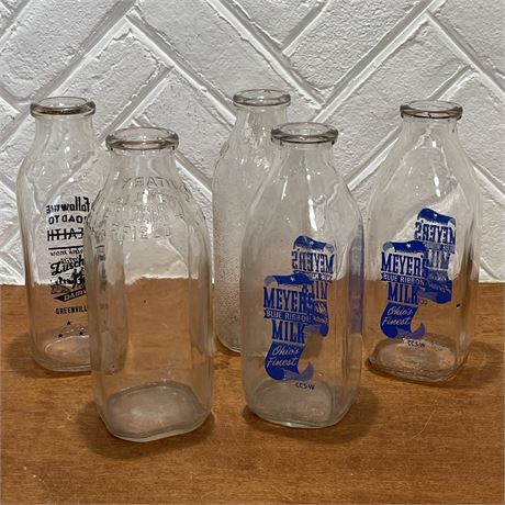 Array of Vintage Glass Milk Bottles