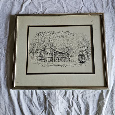 Artwork is a framed print that features a detailed pen-and-ink style drawing