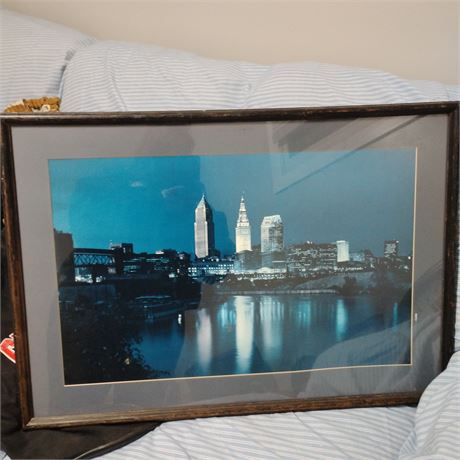Framed print of the Cleveland, Ohio skyline at night.