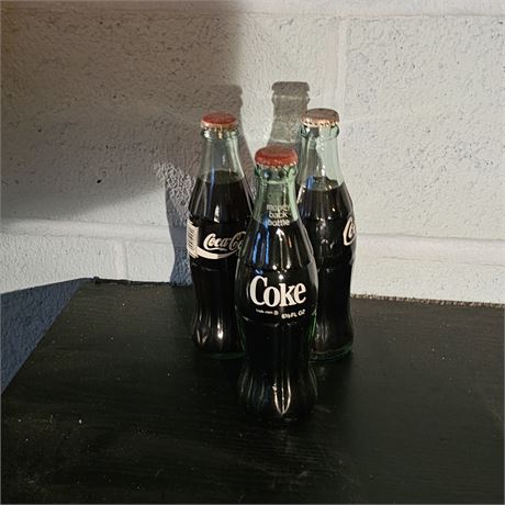 3  Collectible Coca-Cola Bottles