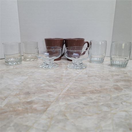 Pairs of cups and mugs