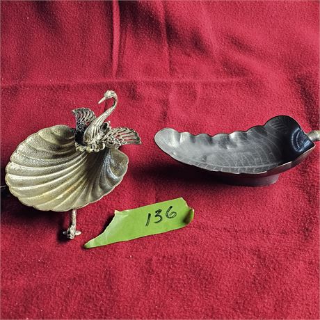 scallop shell.  decorative swan with articulated wings as a handle on one side,