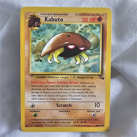 Kabuto Pokémon trading card.
