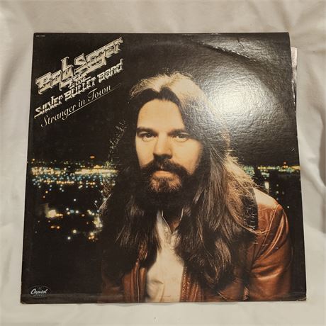 "Stranger in Town" by Bob Seger & The Silver Bullet Band.
