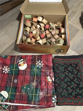 Box of home made garland, 2 holiday tablecloths