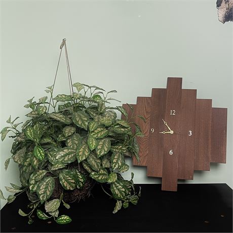 Wooden Wall Clock with Hanging Wire Planter Filled with Faux Foliage