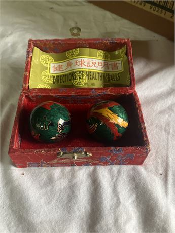 Pair of traditional Chinese Baoding balls in a presentation box